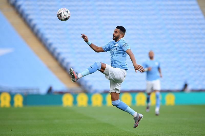 Riyad Mahrez of Manchester City controls the ball. 